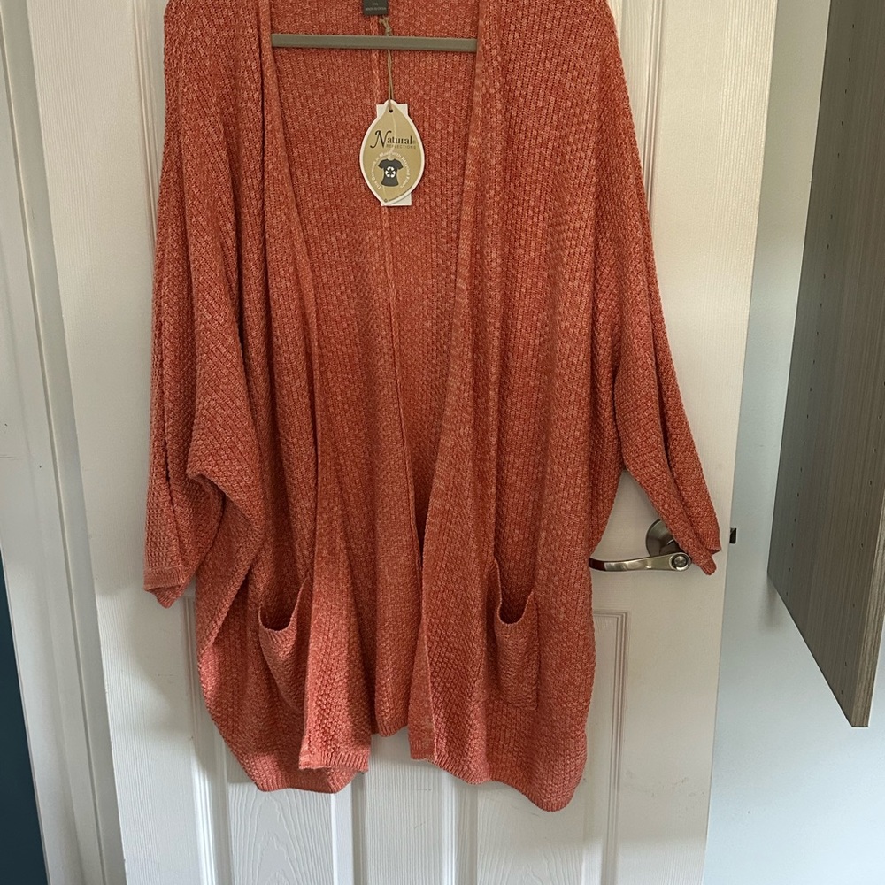 New orange mode right open cardigan.